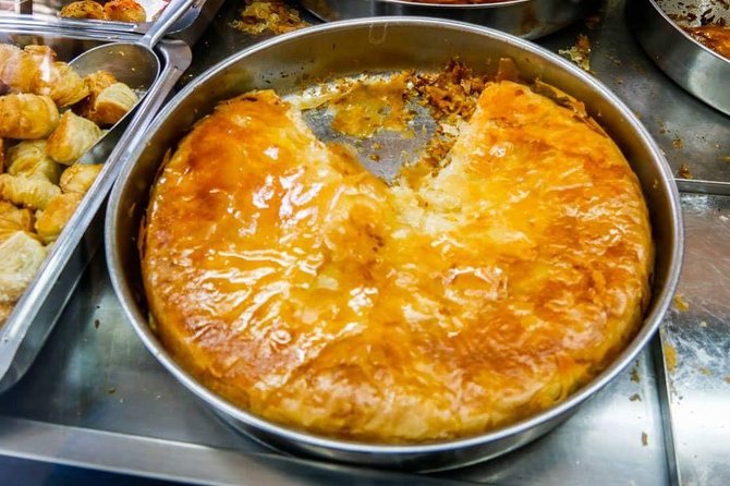 Food Tasting at Locals Favorite Farmers Market in Belgrade - The opening bite: hot burek at an old bakery